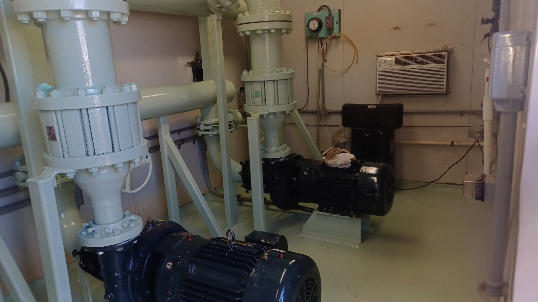 A booster pump station showing 2 pumps side by side.
